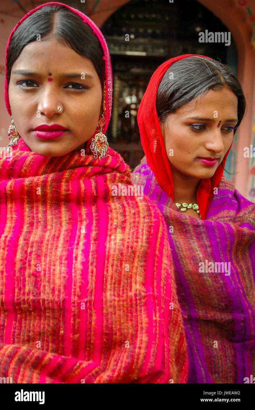 Two young Hindu women dawn traditional attire Stock Photo