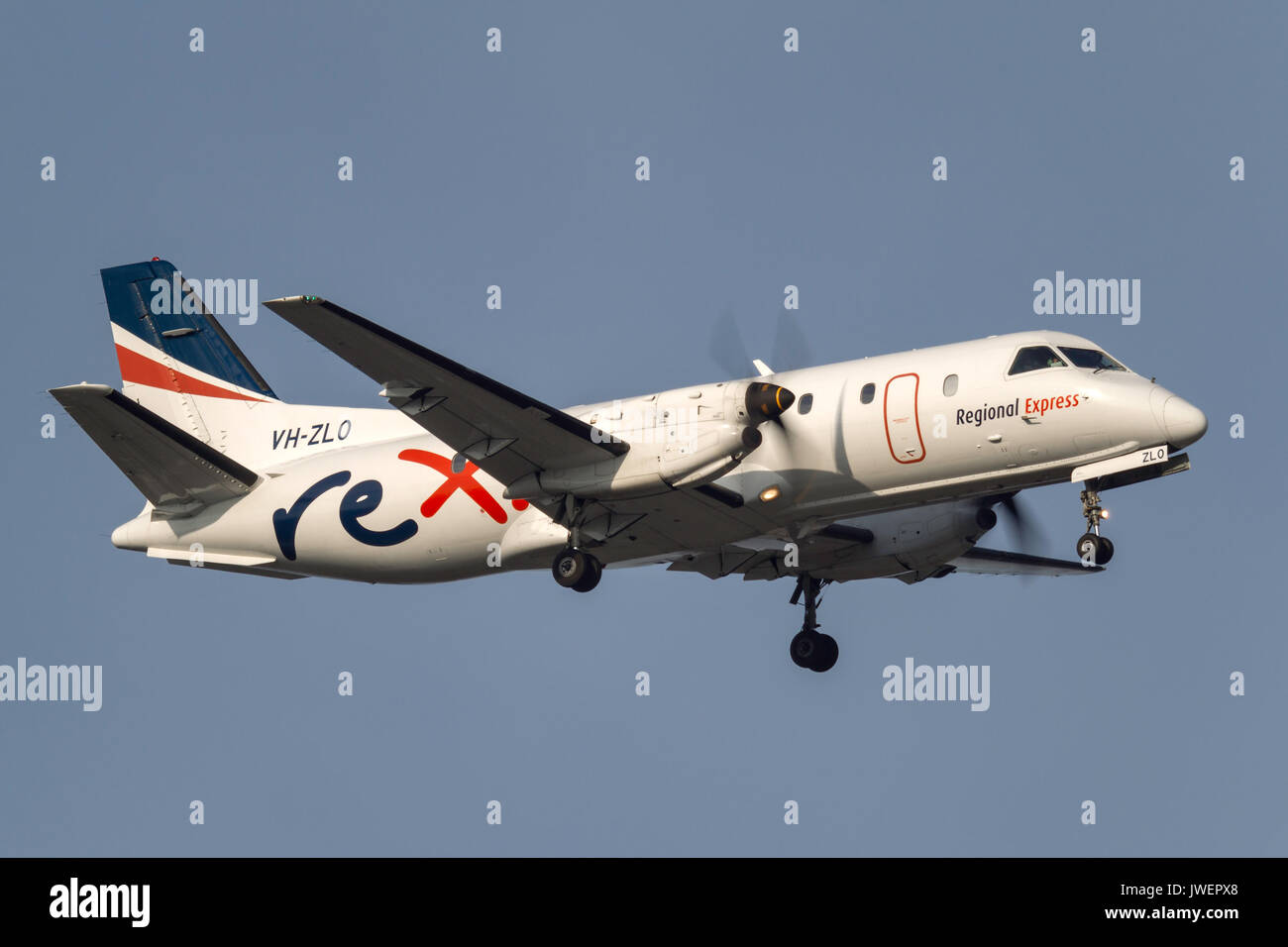 Regional Express (REX) Airlines Saab 340B VH-ZLO on approach to land at Melbourne International Airport. Stock Photo