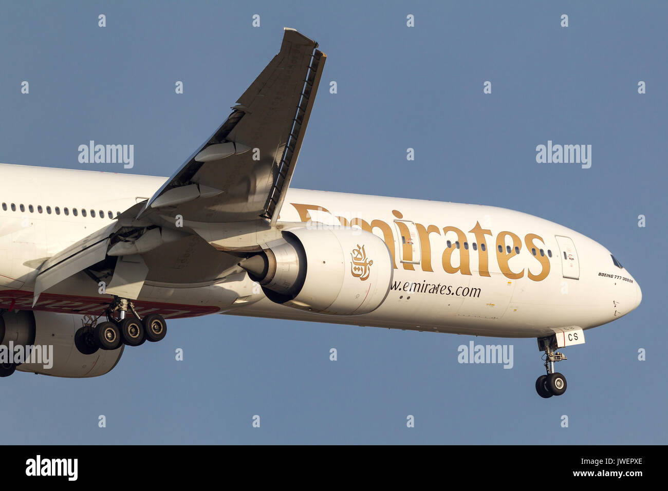 Emirates Boeing 777-31H/ER A6-ECS on approach to land at Melbourne International Airport. Stock Photo
