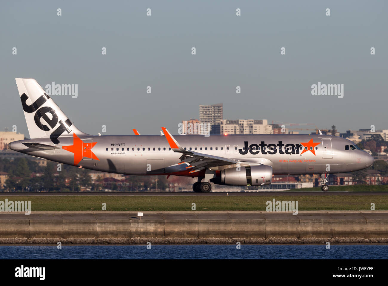 Jetstar Airways Airbus A320 airliner landing at Sydney Airport. Stock Photo