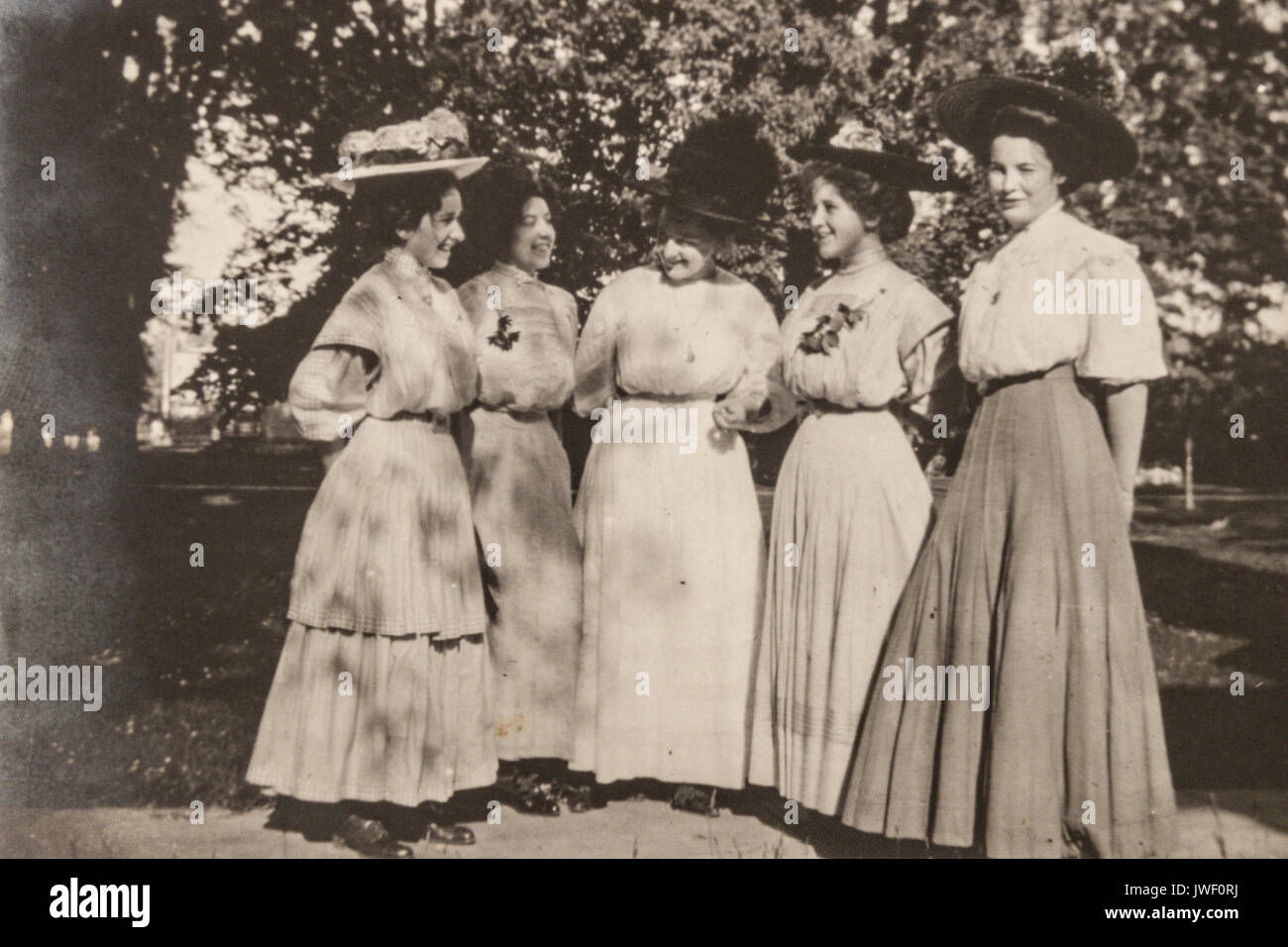 Women with big hats in Minnesota USA 1907-1908 having fun Stock Photo