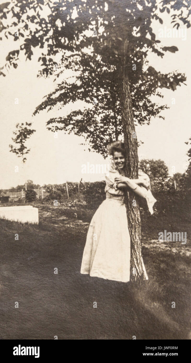 A Tree Hugger in MInnesota USA 1907-1908 having fun Stock Photo