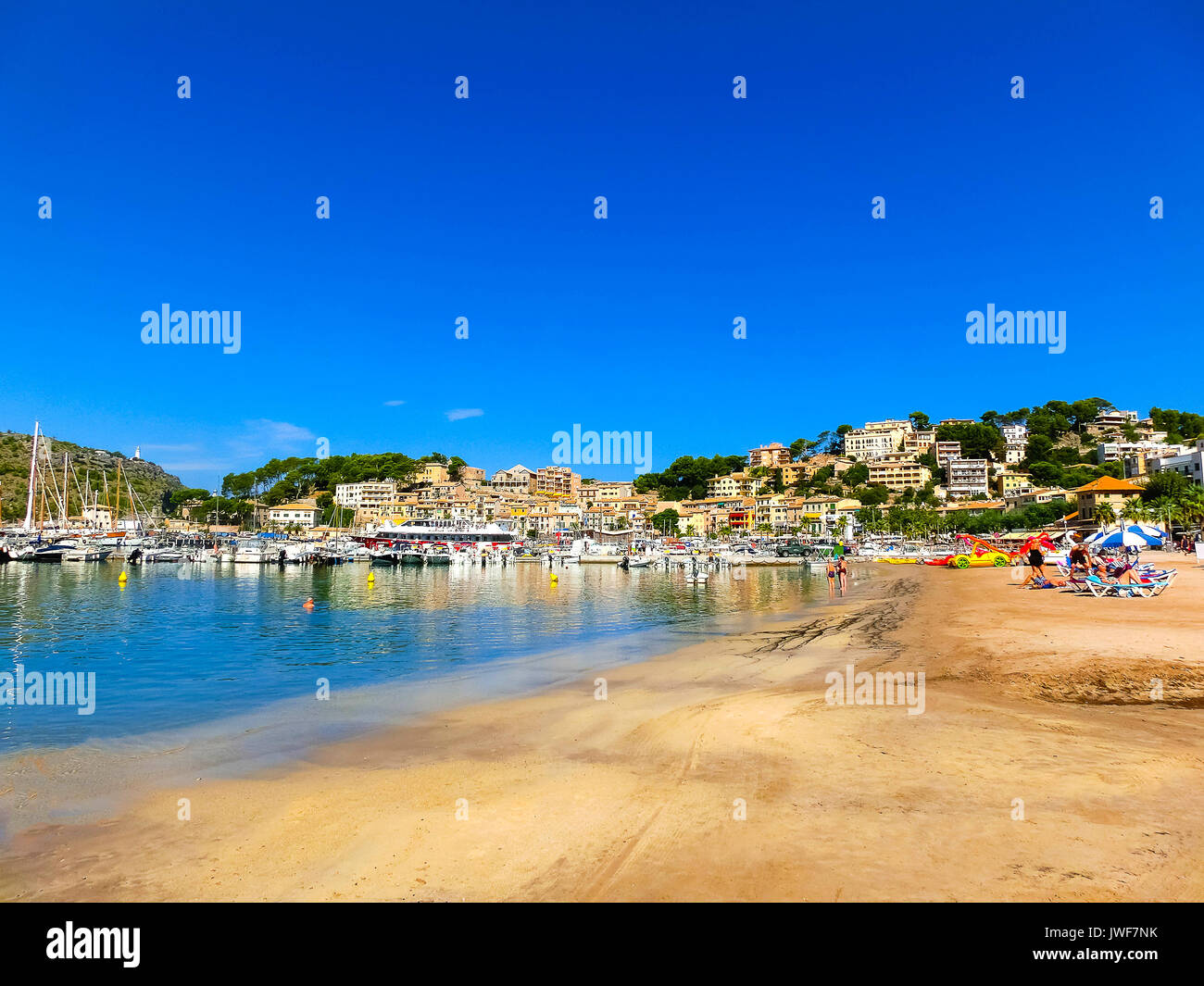 Palma de Mallorca, Spain - September 07, 2015: View of the beach of Port de Soller with people lying on sand, Soller, Balearic islands, Spain. Stock Photo
