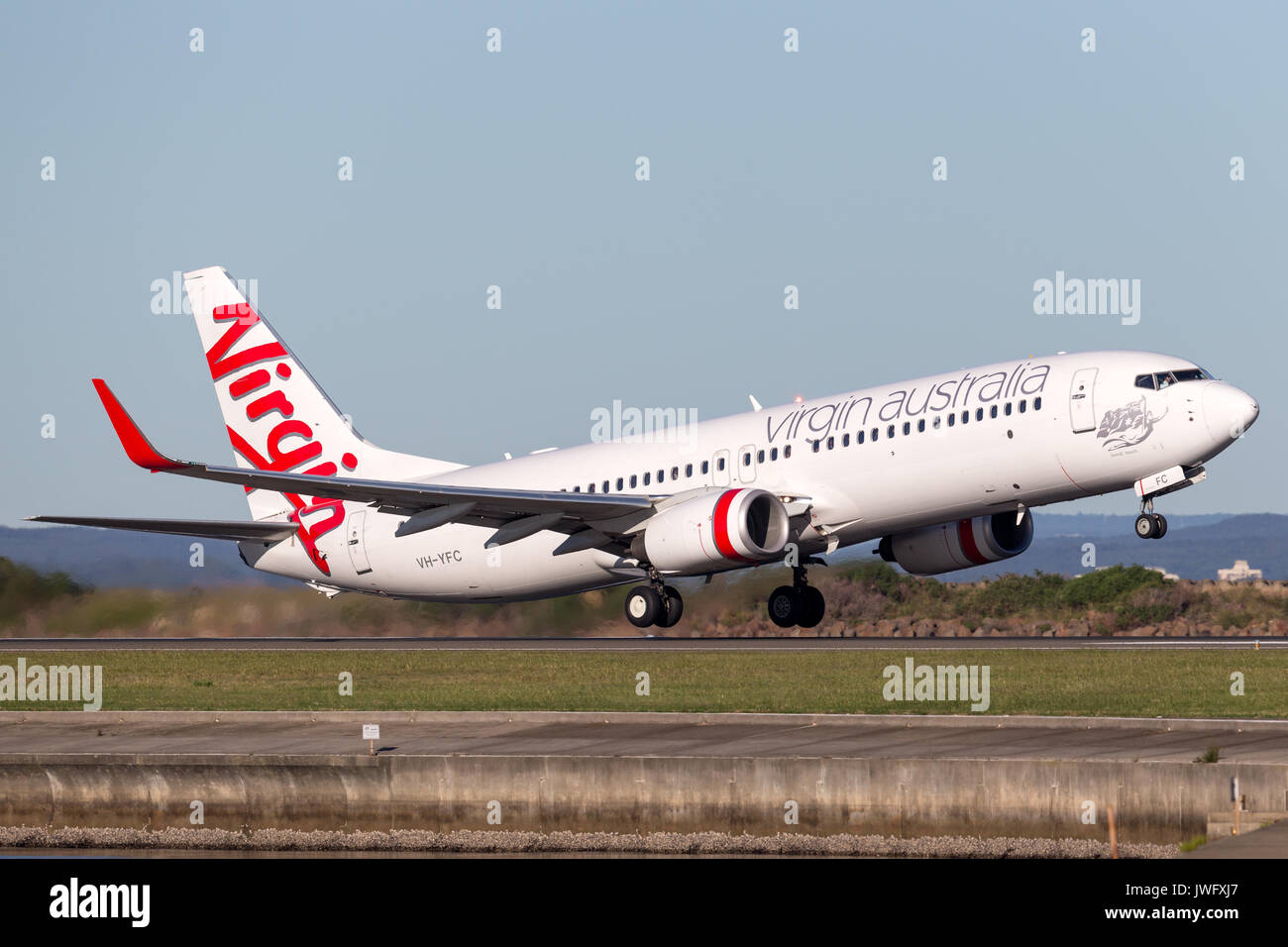 Virgin Australia Airlines Boeing 737-800 aircraft taking off from Sydney Airport. Stock Photo