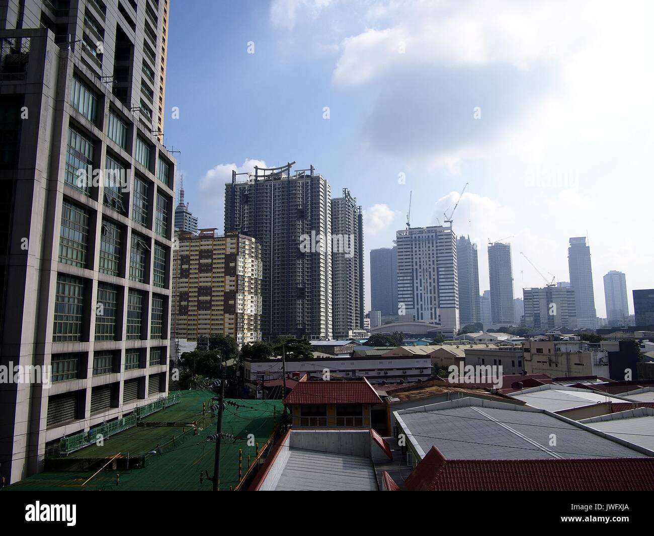 MANDALUYONG CITY, PHILIPPINES - AUGUST 8, 2017: Commercial and residential buildings. Stock Photo