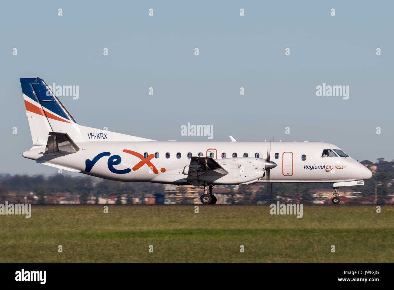 REX (Regional Express Airlines) Saab 340 twin engined regional commuter aircraft at Sydney Airport. Stock Photo