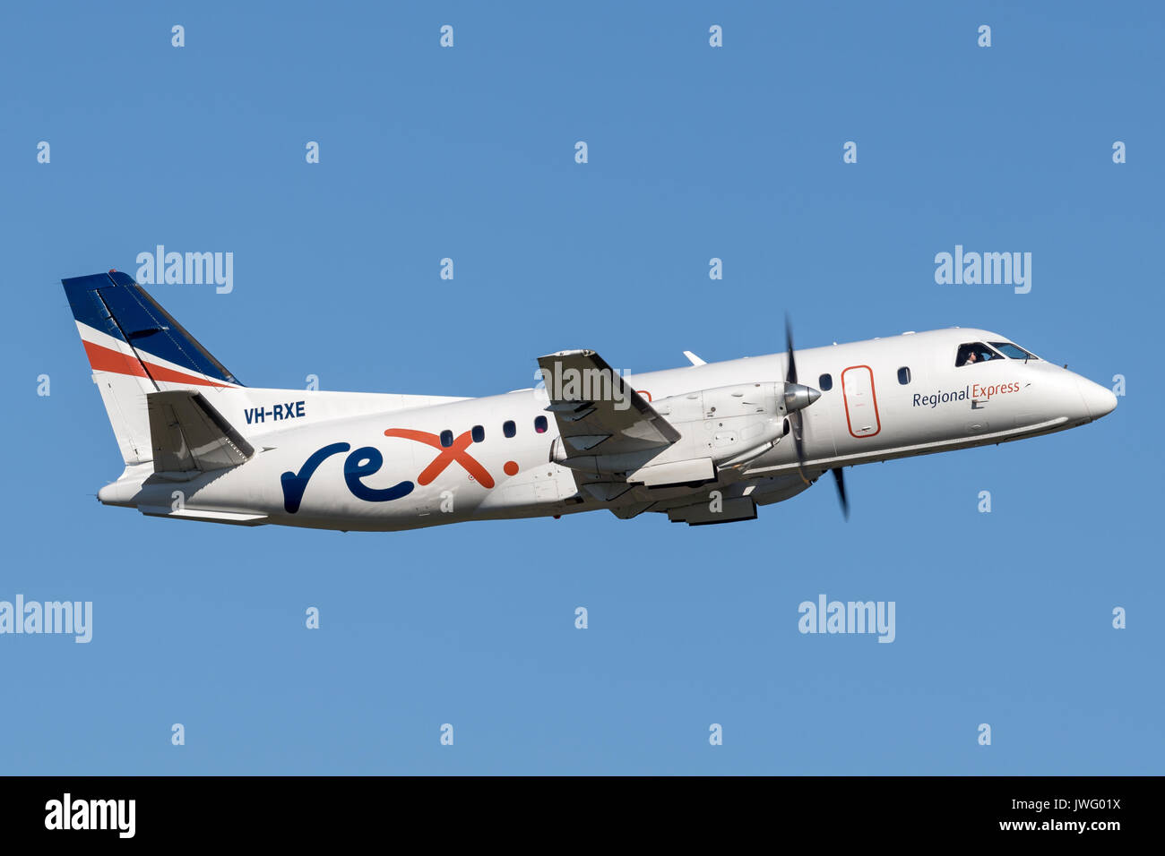 REX (Regional Express Airlines) Saab 340 twin engined regional commuter aircraft taking off from Sydney Airport. Stock Photo