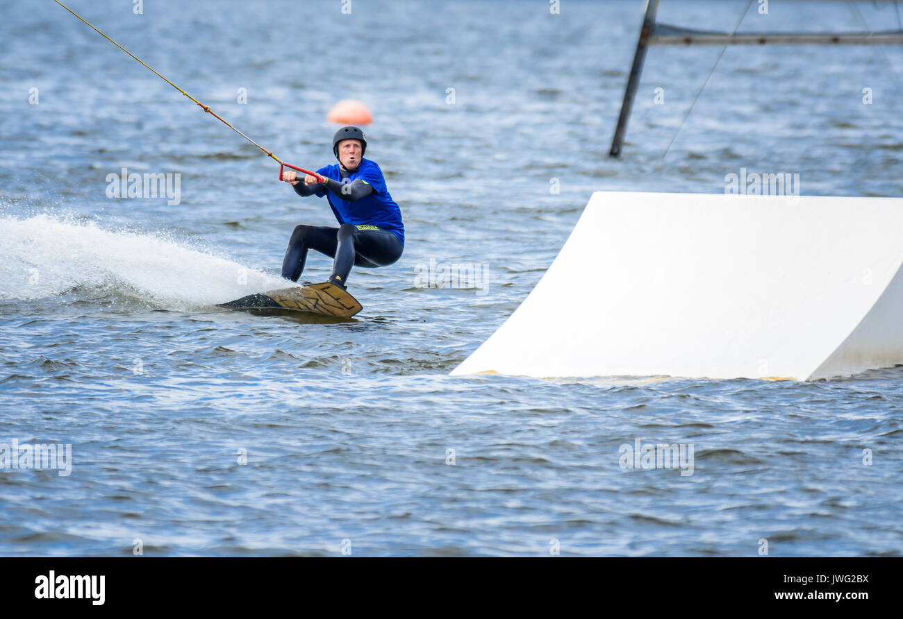 Wakeboarding via a cable tow system at Chasewater, Staffordshire, UK