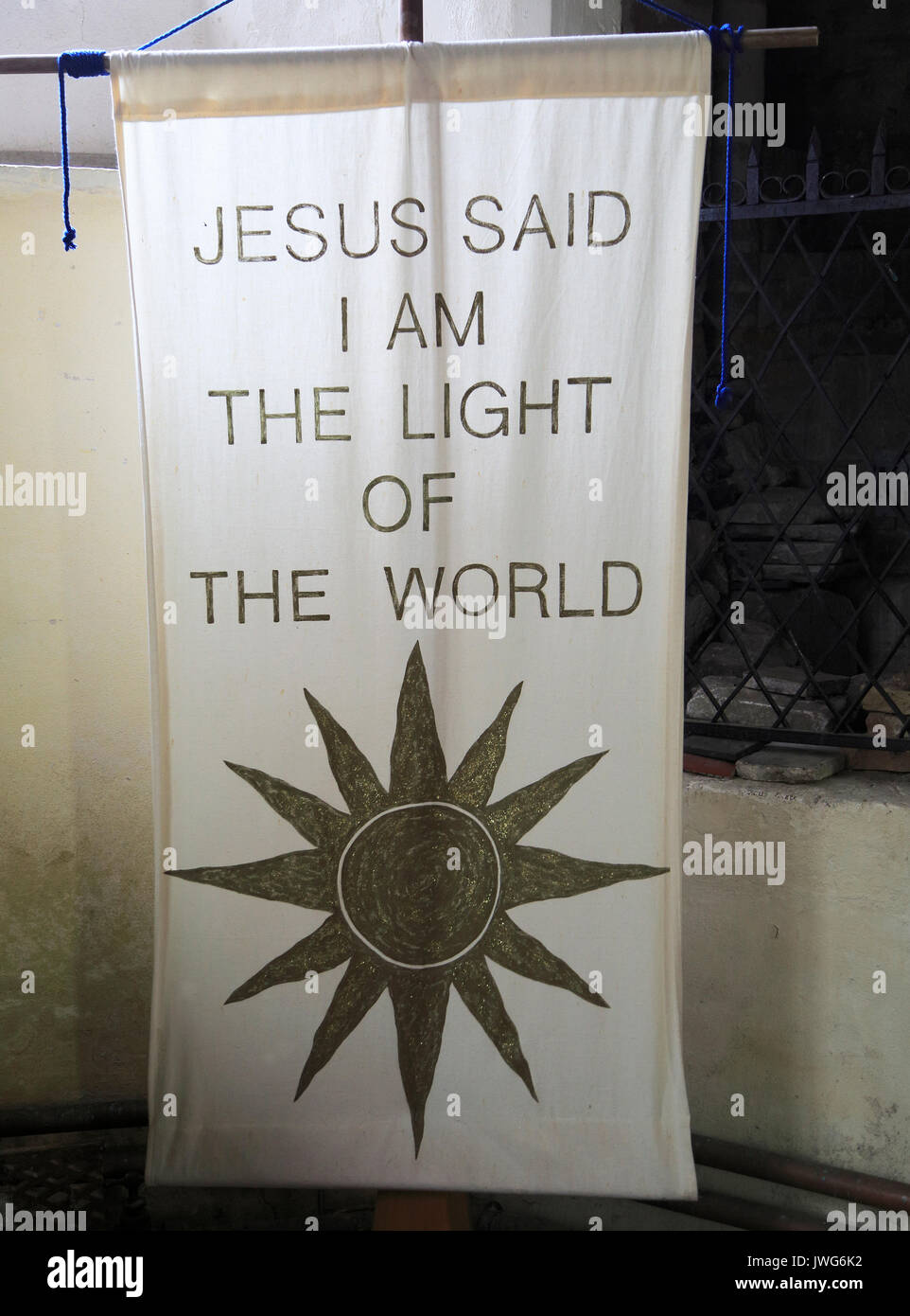 Religious banner inside Church of Saint Mary, Coddenham, Suffolk, England, UK - Jesus the light of the world Stock Photo