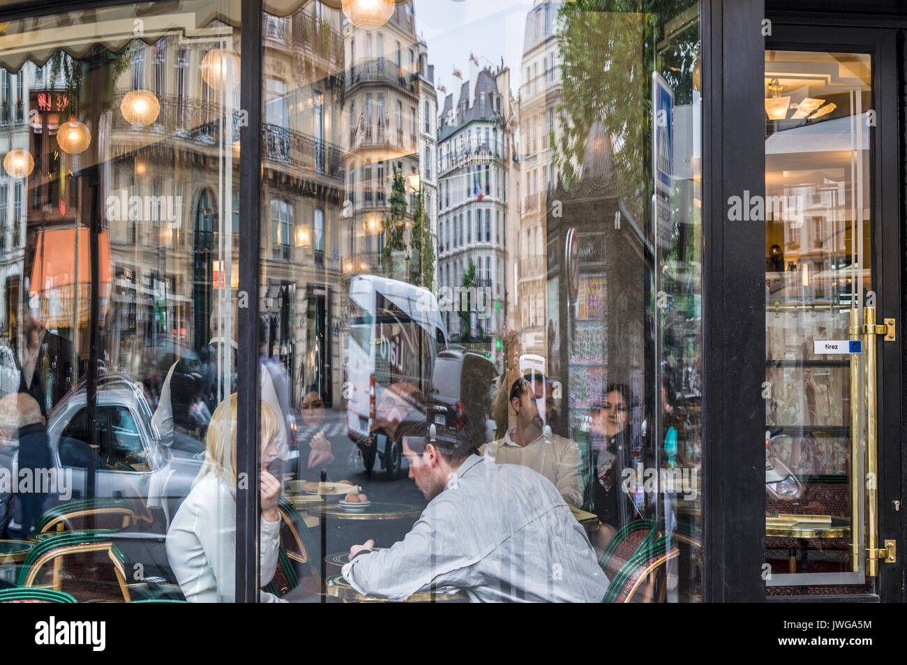 Cafe de Flore in Paris, France exterior frontage reflections in windows Stock Photo