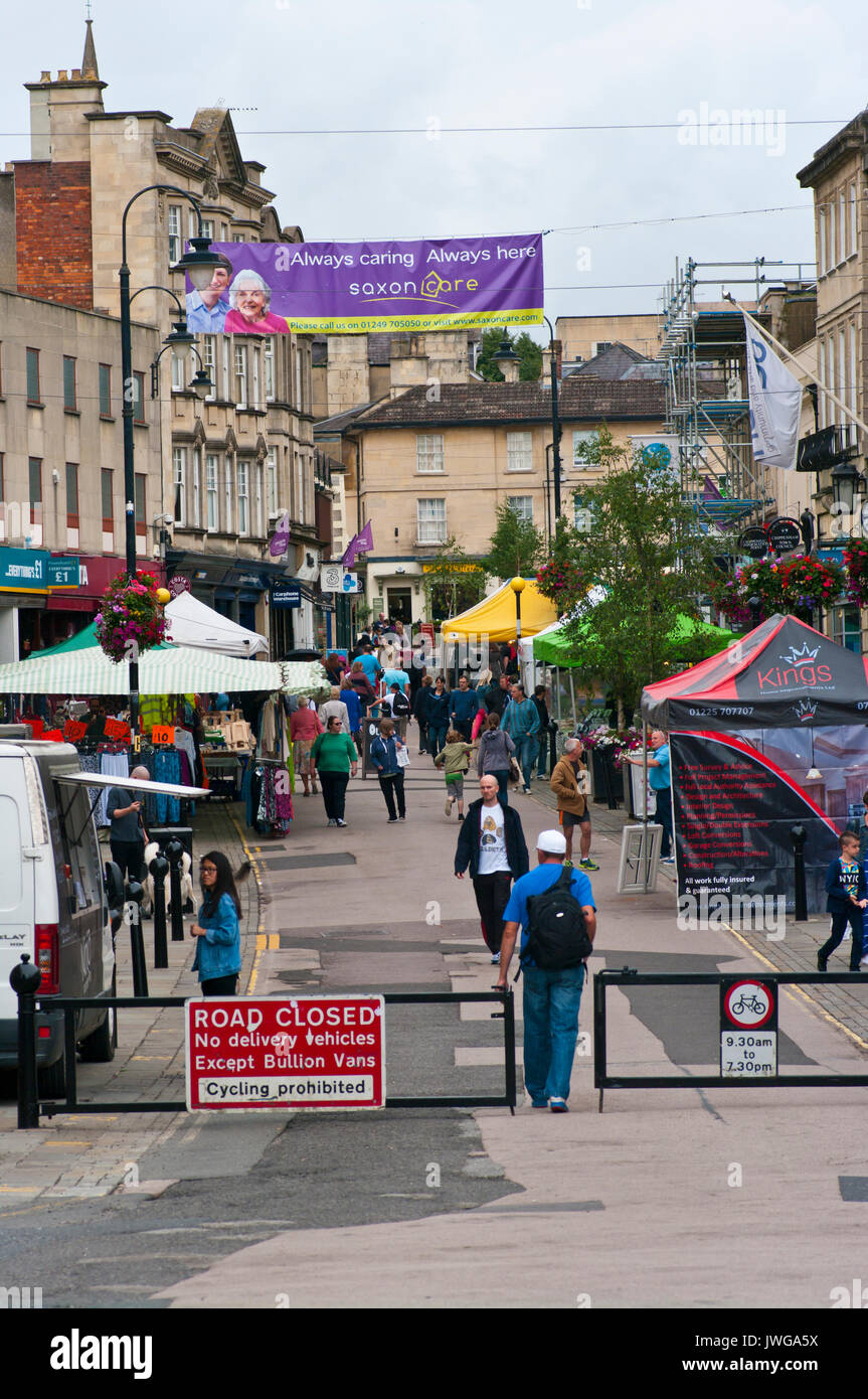 View Up The Outdoor Street Market The High Street Chippenham Wiltshire England UK Stock Photo