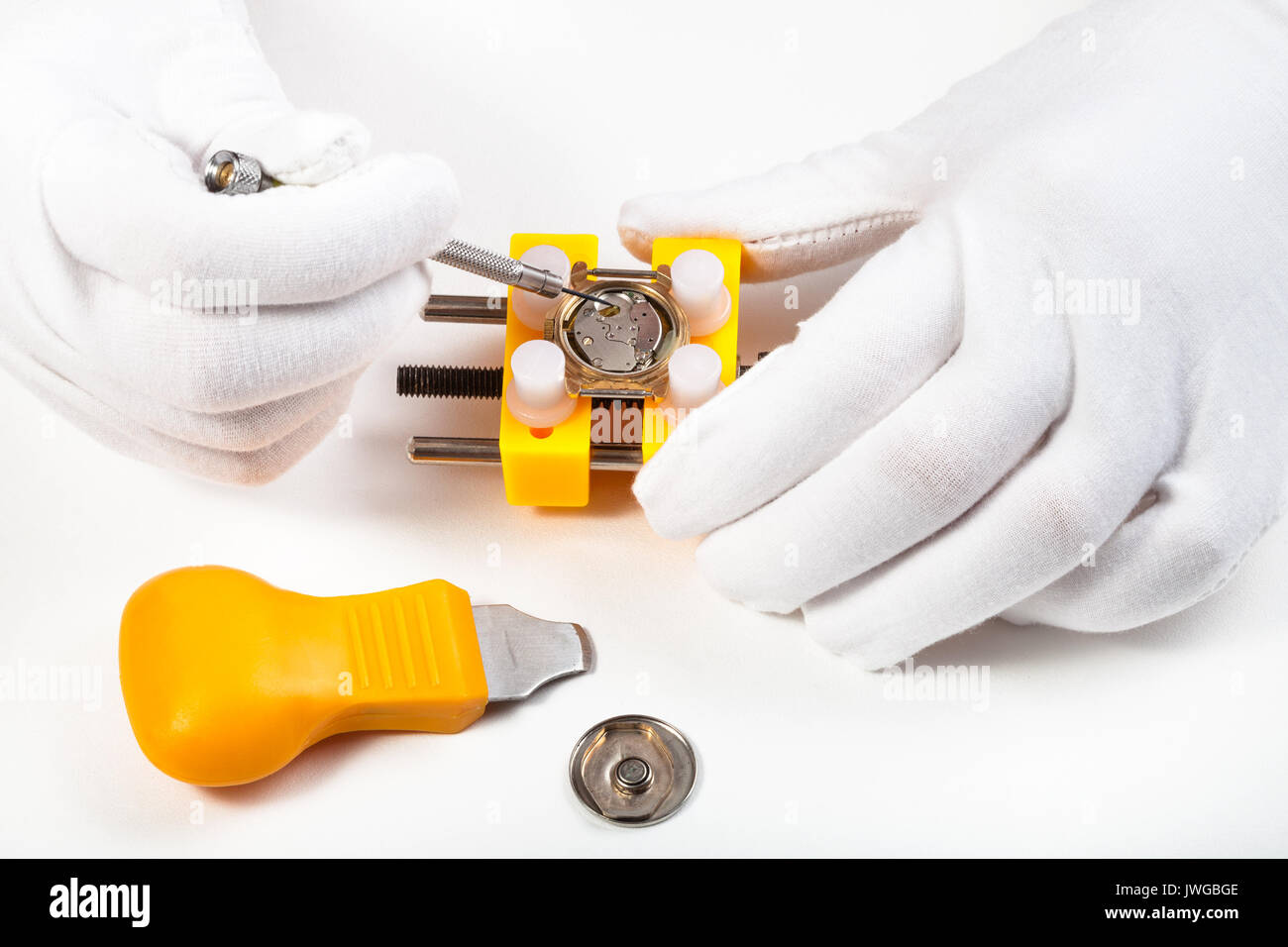 watchmaker workshop - cleaning battery place in quartz wristwatch by ...