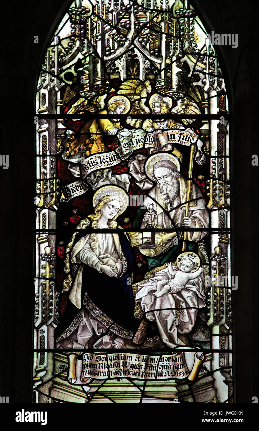 Birth of Jesus, stained glass window above altar Church of Saint Mary, Coddenham, Suffolk, England, UK Stock Photo
