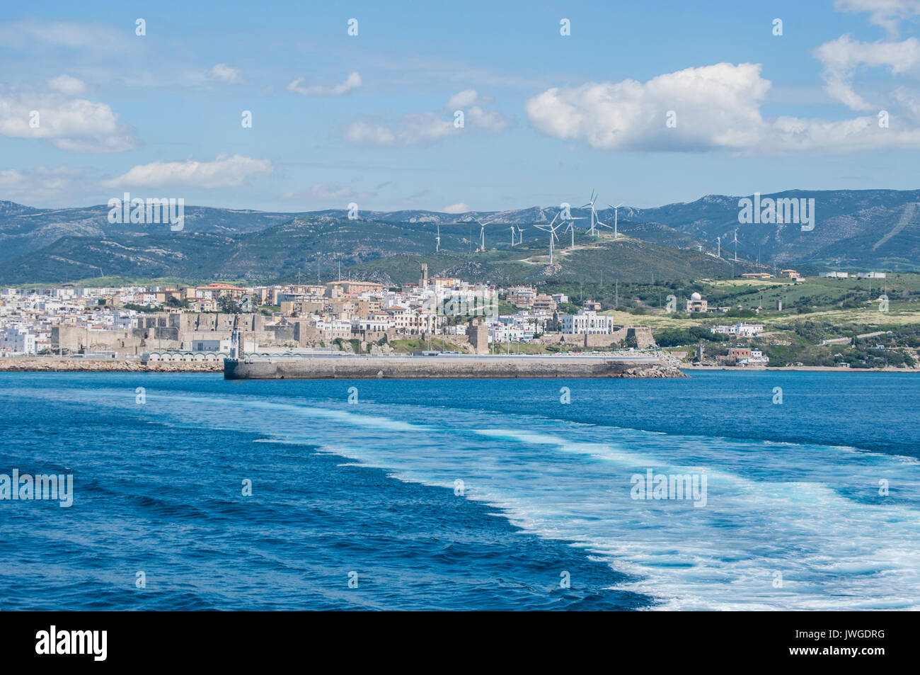 Tarifa: skyline seen from the Strait of Gibraltar that connects Spain to Morocco, the stretch of sea that joins Atlantic Ocean to Mediterranean Sea Stock Photo