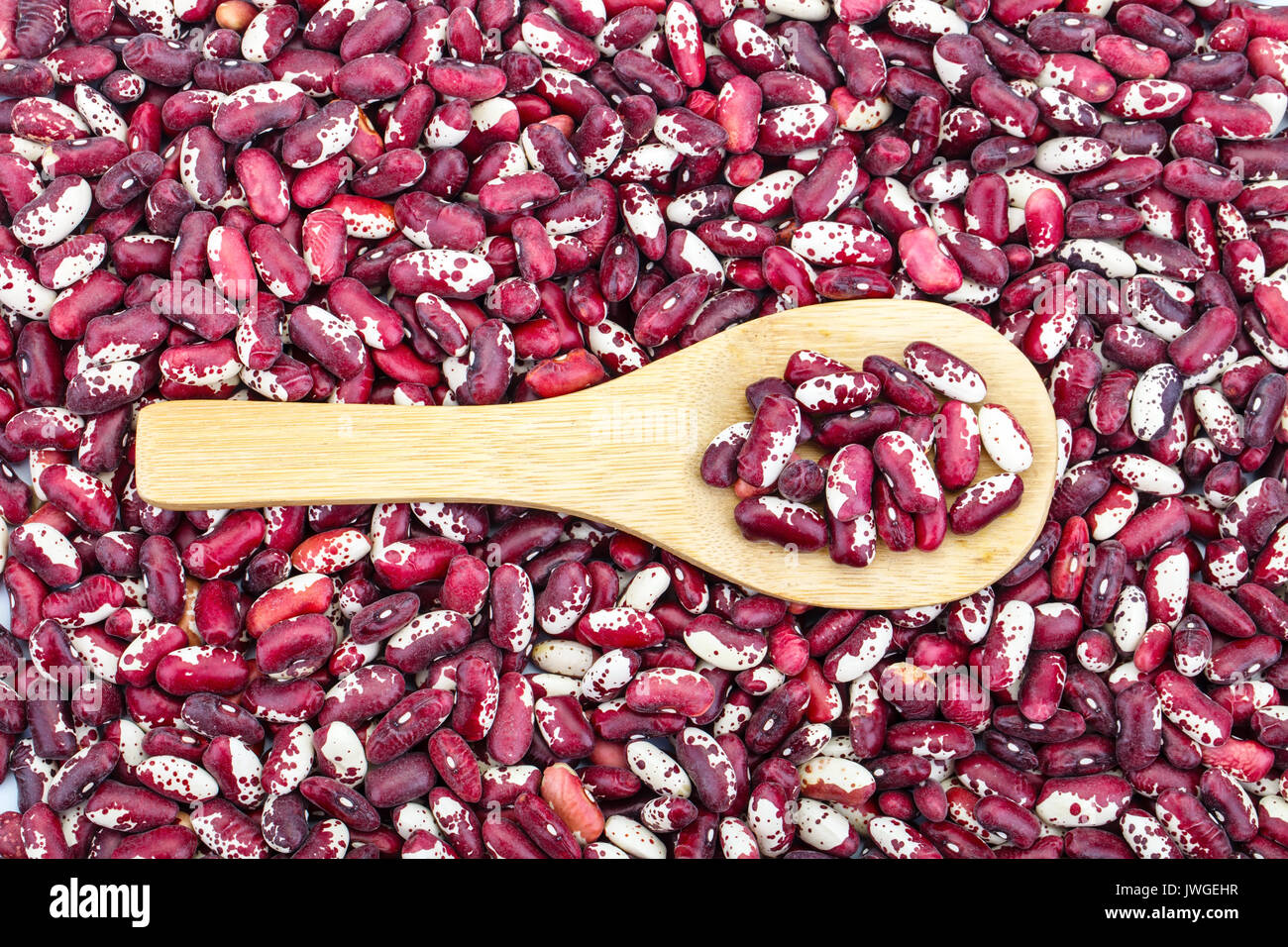The background of red beans and a wooden spoon Stock Photo Alamy
