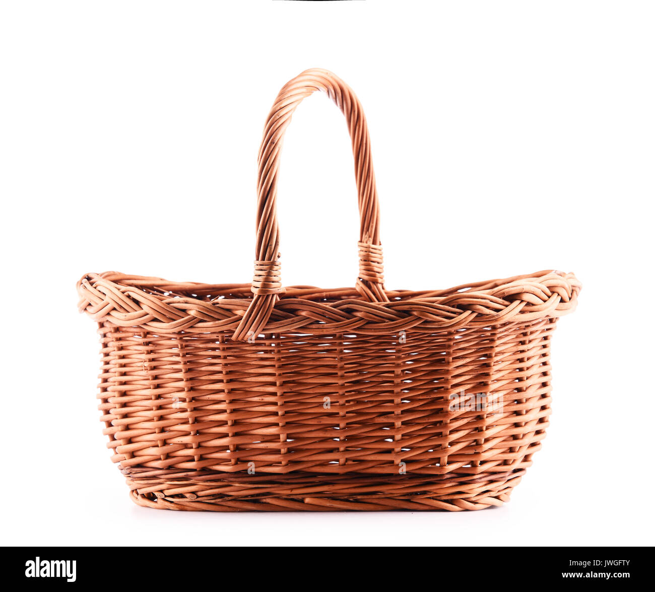Empty wicker basket isolated on white background Stock Photo - Alamy