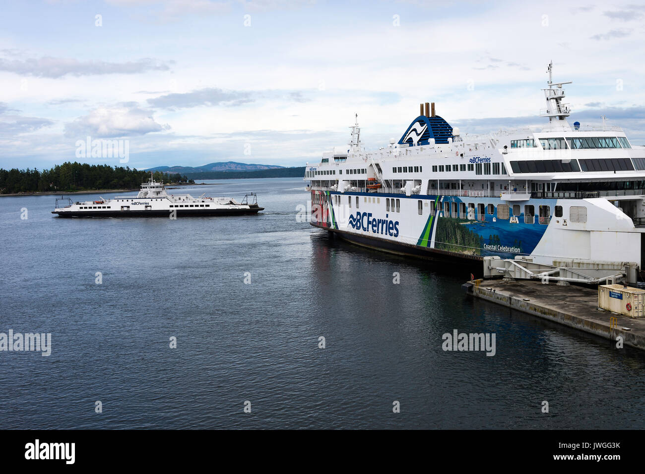 Two BC Ferries Car and Passenger Ferries MV Skeena Queen and MV Coastal Celebration at Swartz Bay Vancouver Island British Columbia Canada Stock Photo
