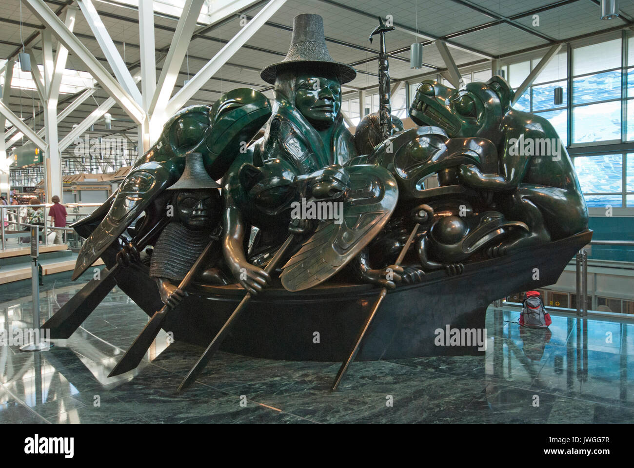 The Spirit of Haida Gwaii: The Jade Canoe, bronze sculpture by Haida artist Bill Reid, Vancouver International Airport, British Columbia, Canada Stock Photo