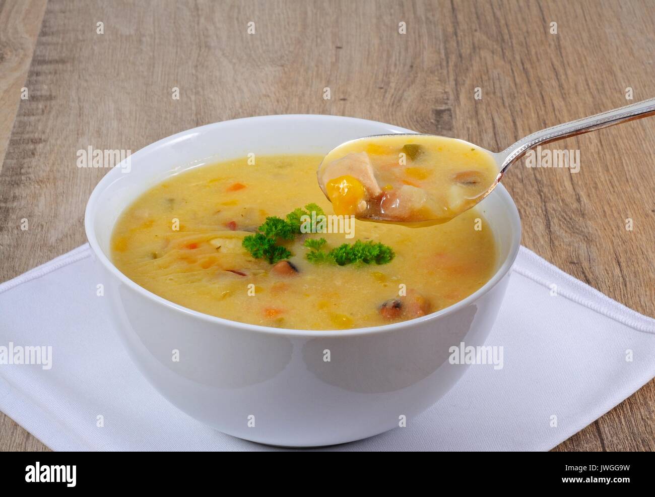 Fish chowder soup including smoked haddock, cod, salmon and vegetables