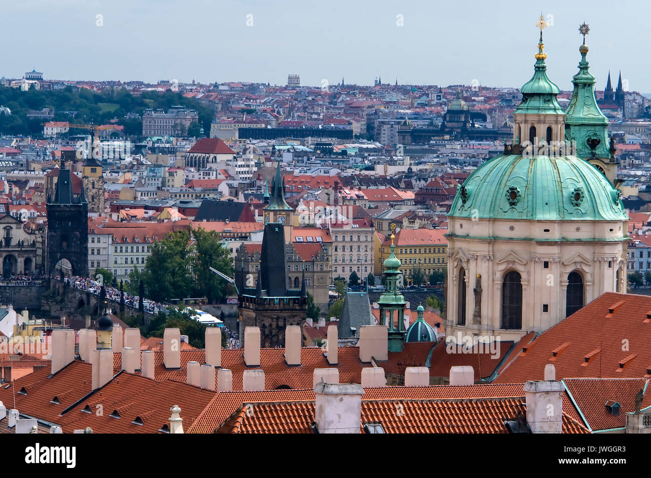 St. Nicolas church and roofs of Prague Stock Photo