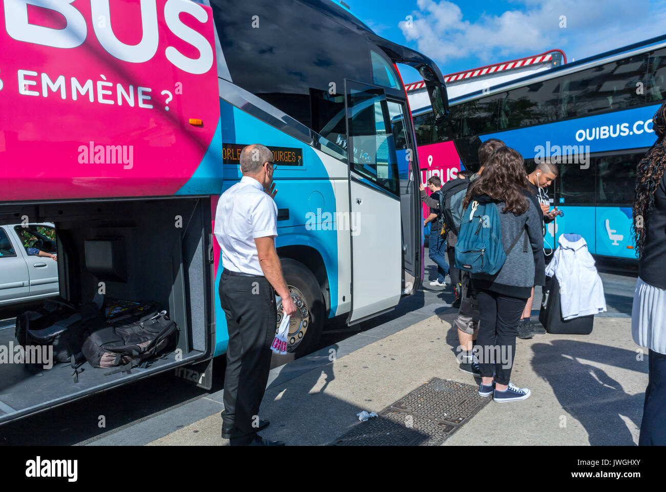 Paris, France, Teen Tourists Travelling on Low Cost, DIscount Bus, Ouibus, Gare de Bercy, bus stop paris Stock Photo