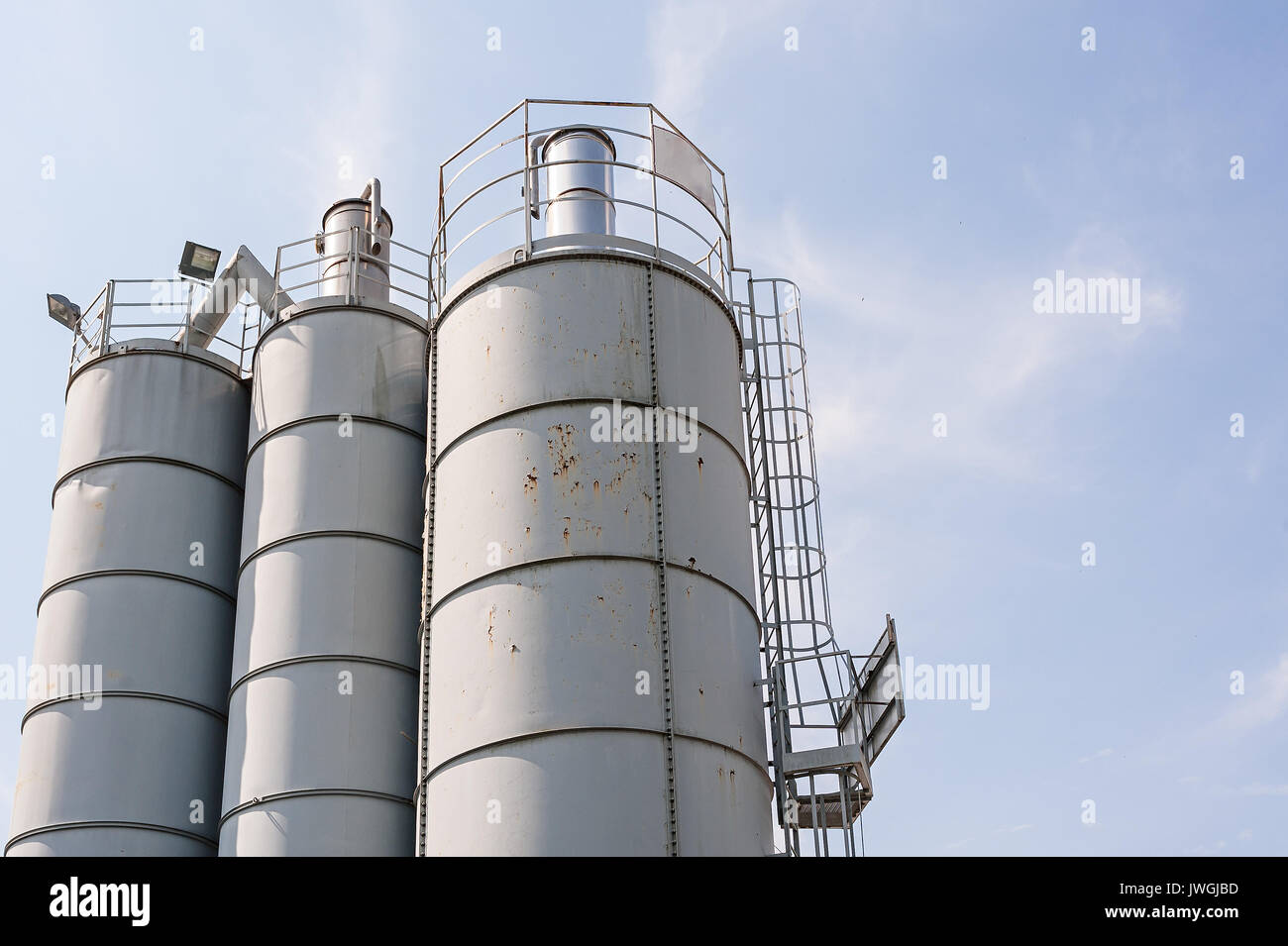 Industrial silos for storage of concrete for construction industry. Stock Photo
