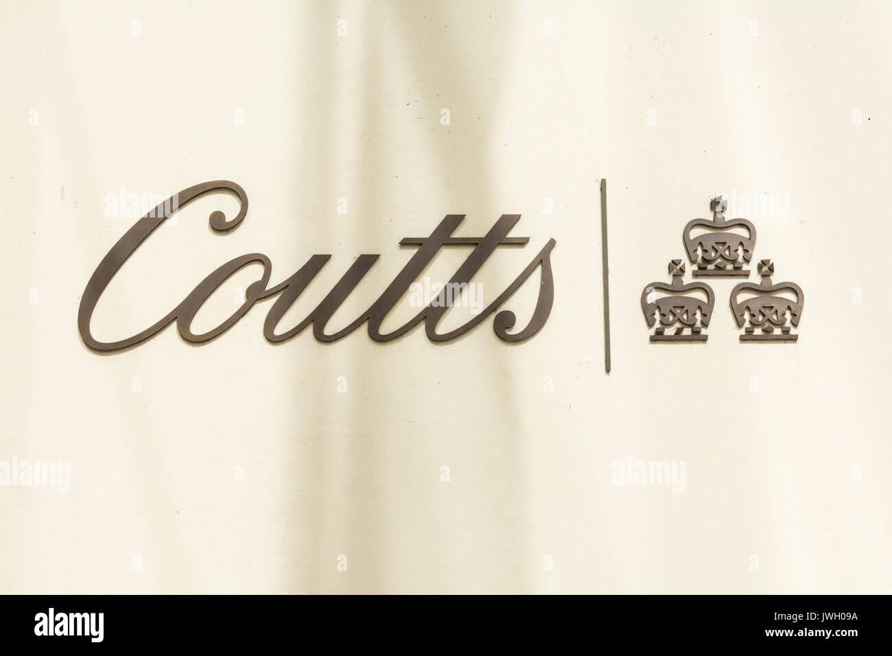 Signage outside Coutts & Co, The Queen's bank on the Strand, London, UK Stock Photo