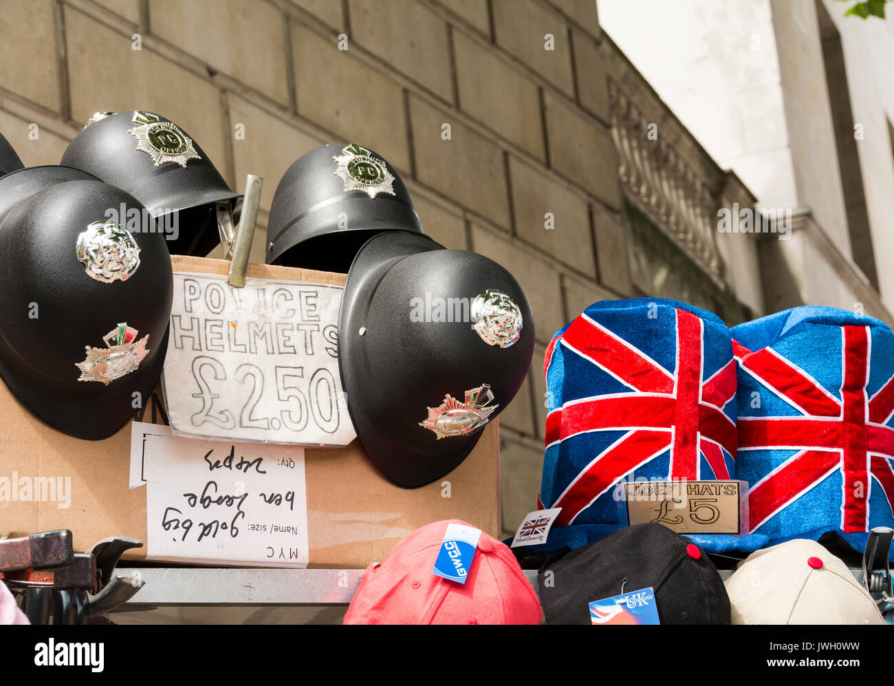 Plastic copies of the world famous Metropolitan Policemen's Custodian helmet Stock Photo