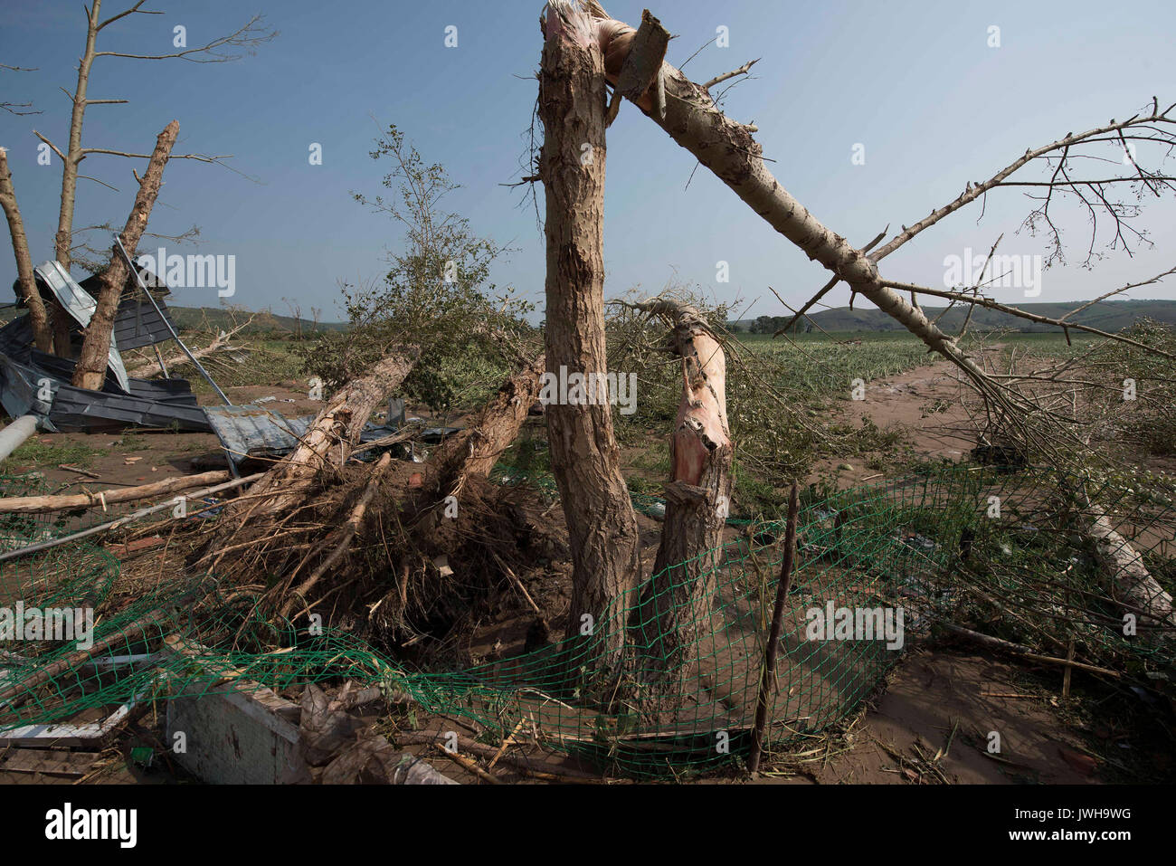 Chifeng. 12th Aug, 2017. Photo taken on Aug. 12, 2017 shows a disaster site after a cyclone in Wutaishan Vilalge of Tuchengzi Town, Hexigten Banner of Chifeng City, north China's Inner Mongolia Autonomous Region. At least five people were killed and 50 others injured after a cyclone hit four villages of Hexigten Banner and Ongniud Banner in Chifeng City at 4 p.m. Friday. Credit: Sun Guoshu/Xinhua/Alamy Live News Stock Photo