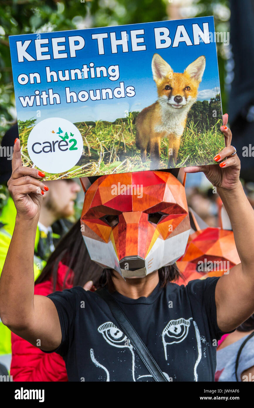 London, UK. 12th Aug, 2017. In a Protest organised by the Make Hunting History coalition, the Badger Trust and Care2 demonstrators marched through central London and rallied outside of Downing Street. Credit: David Rowe/Alamy Live News Stock Photo
