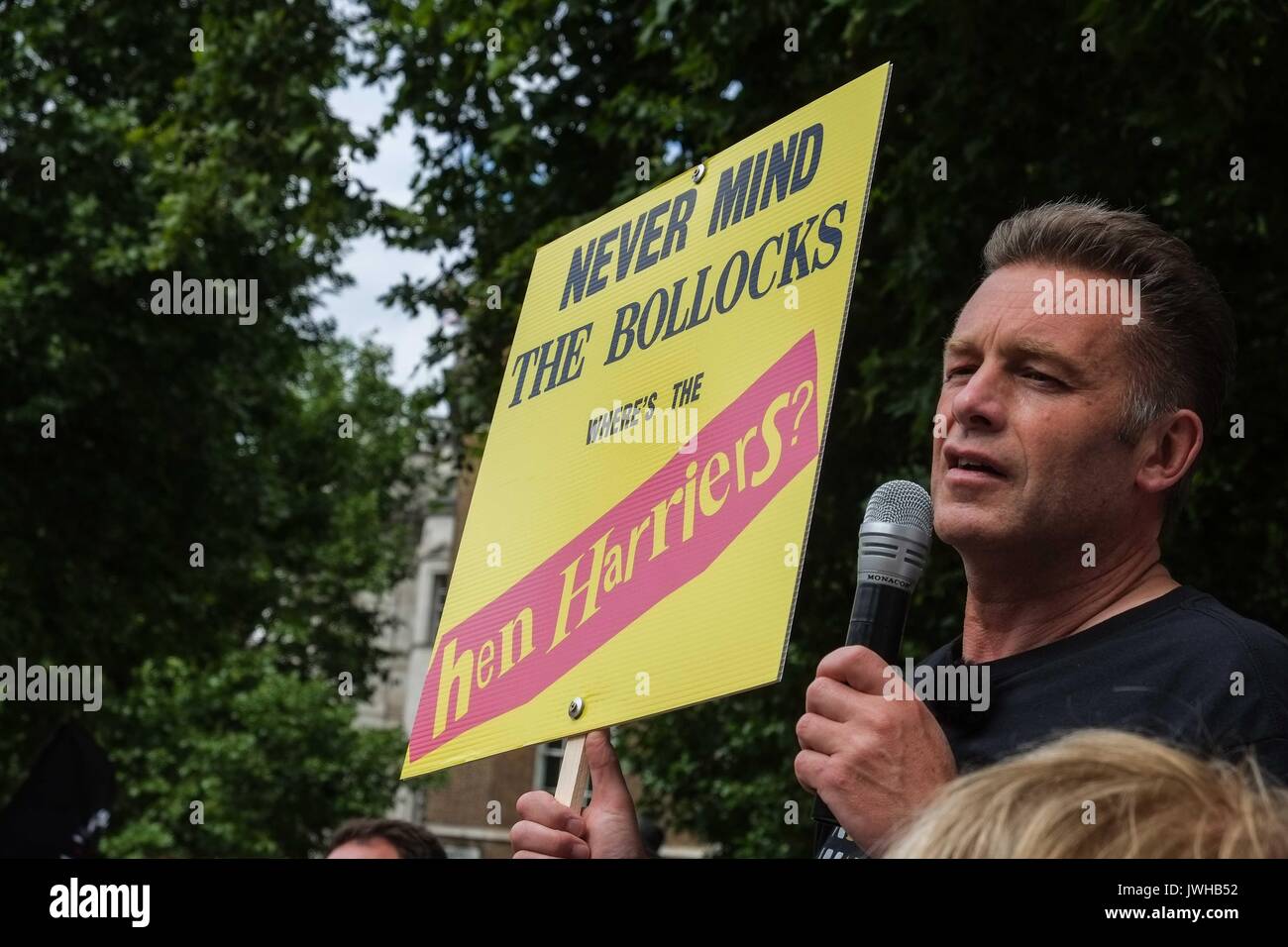 London, UK 12th August 2017. Wildlife TV presenter Chris Packham and organiser of the protest addresses the crowd. To coincide with the first day of the grouse season known as the 'Glorious 12th' hundreds of Anti Blood Sports protesters gather  outside Downing Street to demonstrate against the killing of animals for sport. :Credit: Claire Doherty Alamy/Live News Stock Photo