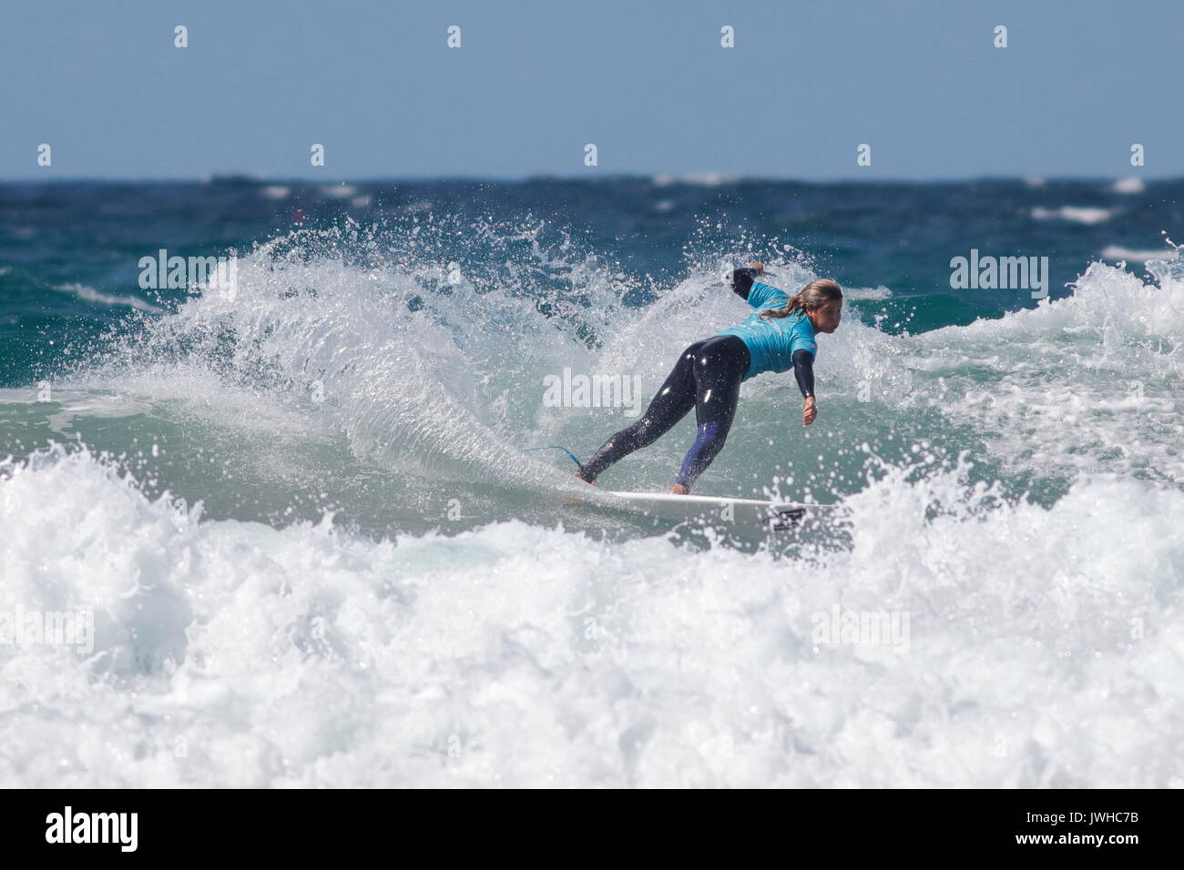 Fistral Beach, Newquay, Cornwall, UK. 12th Aug, 2017. Surfers take part in Day 4 of the Boardmasters Championship. Competitors from around the world take part in the UK's biggest surf contest. Credit: Nicholas Burningham/Alamy Live News Stock Photo
