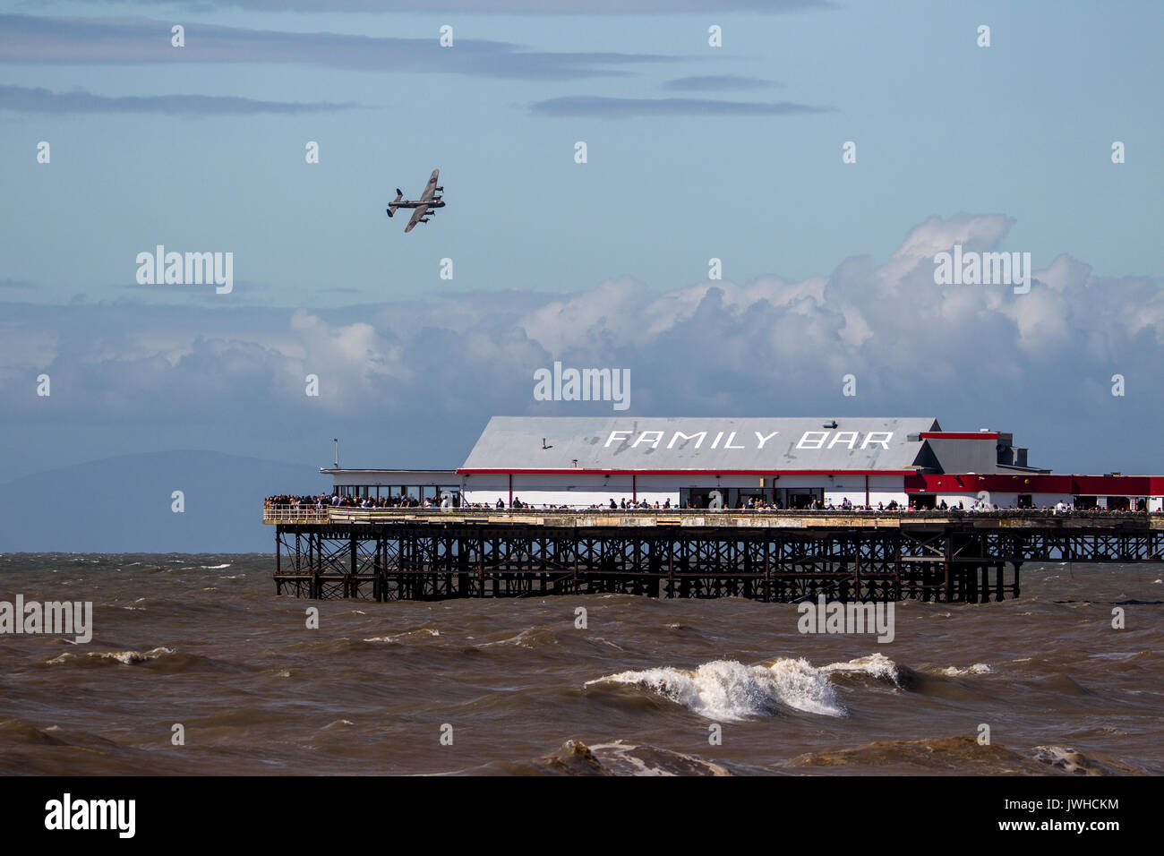 Blackpool, Lancashire, UK. 12th Aug, 2017. RAF Lancaster from the Battle of Britain Memorial Flight over Central Pier at Blackpool Credit: Russell Millner/Alamy Live News Stock Photo