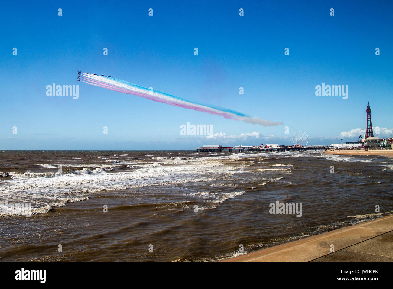 Blackpool, Lancashire, UK. 12th Aug, 2017. RAF Red Arrows finishing their display at Blackpool and departing. Credit: Russell Millner/Alamy Live News Stock Photo