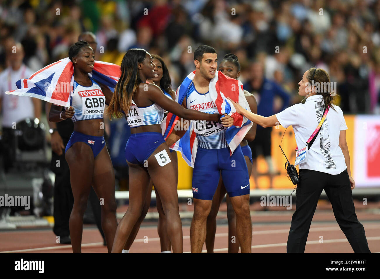 London, UK.  12 August 2017.  Adam Gemilli of the gold winning GB 4x100m relay team celebrates with Team GB's women who won silver in their equivalent race.  USA win gold in the women's 4 x 100m relay final at the London Stadium, on day nine of The IAAF World Championships London 2017.  Second GB, third Jamaica.  Credit: Stephen Chung / Alamy Live News Stock Photo