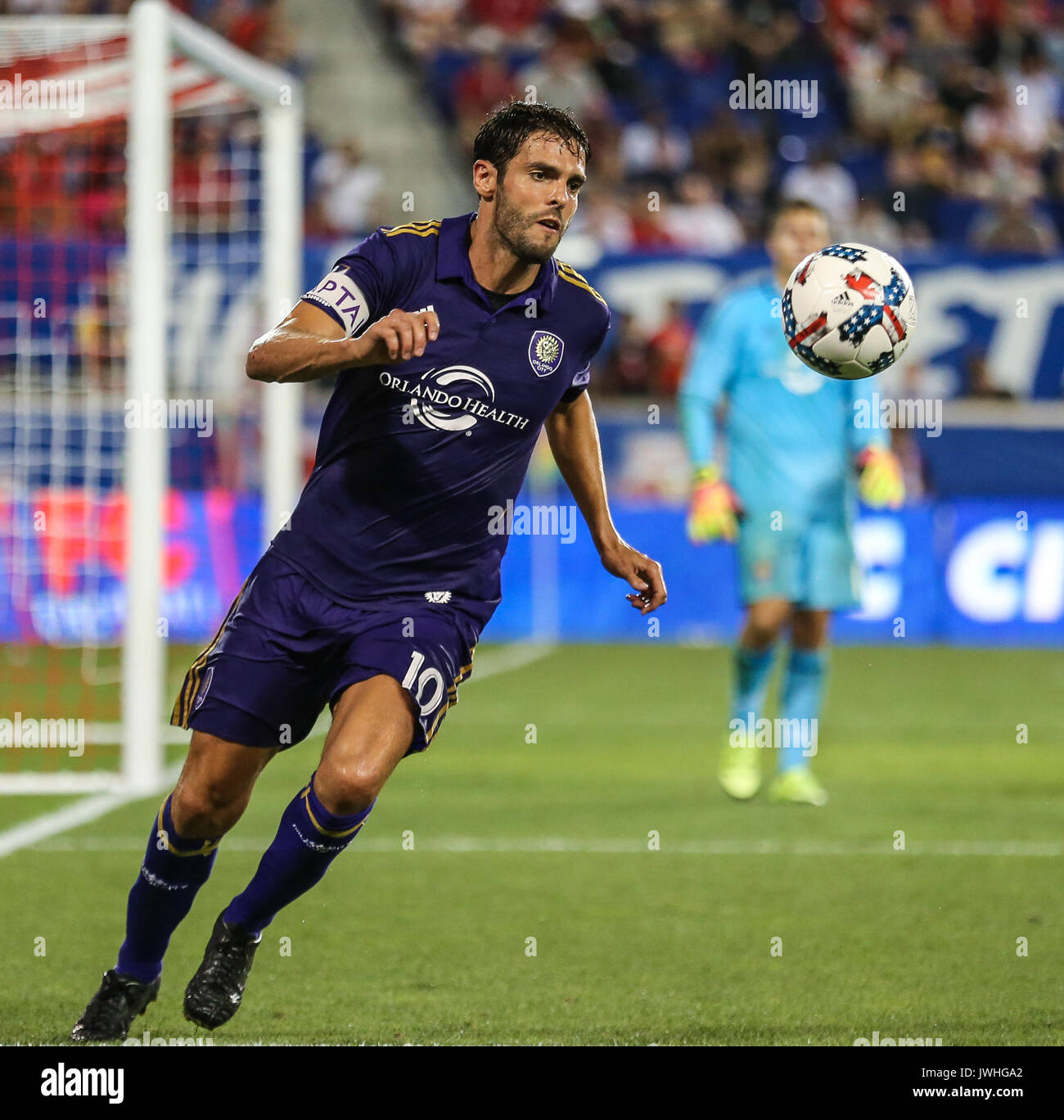 Brazilian soccer star Kaka smiles as he arrives at Orlando International  Airport, Monday, June 30, 2014, in Orlando, Fla. Kaka is the first  designated player to sign with the Orlando City Soccer