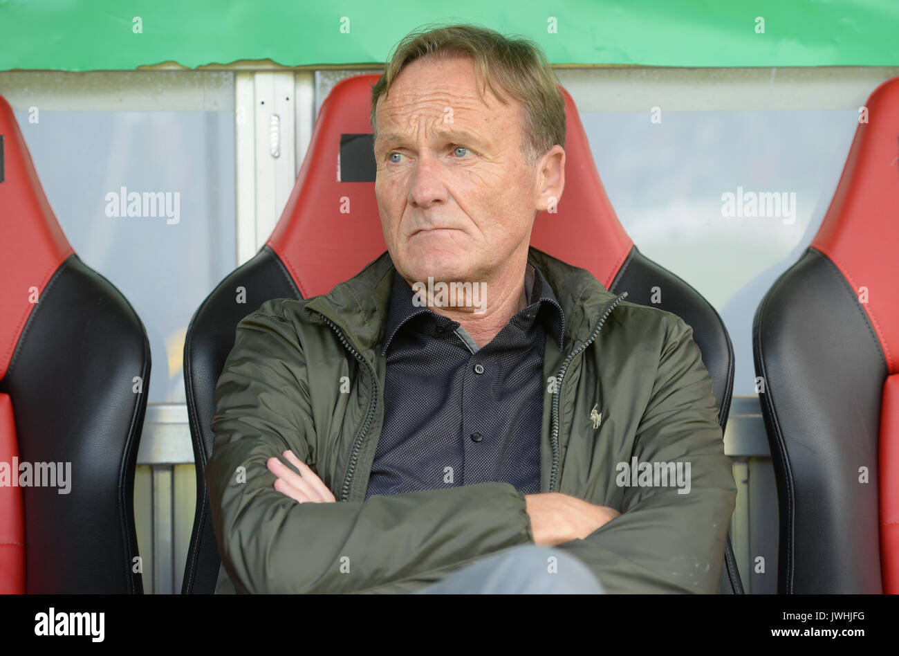 Dortmund's CEO Hans-Joachim Watzke sits on the bench ahead of the German Soccer Association (DFB) Cup first-round soccer match between 1. FC Rielasingen-Arlen and Borussia Dortmund in the Schwarzwald Stadium in Freiburg, Germany, 12 August 2017. The club has announced that Ousmane Dembele, the young attacking midfielder whose breakout season at the club has led to him being linked with clubs across Europe including Barcelona, will remain suspended from the team 'until further notice'. The announcement was made on Sunday morning at a conference with Dortmund's sports director Michael Zorc, mana Stock Photo