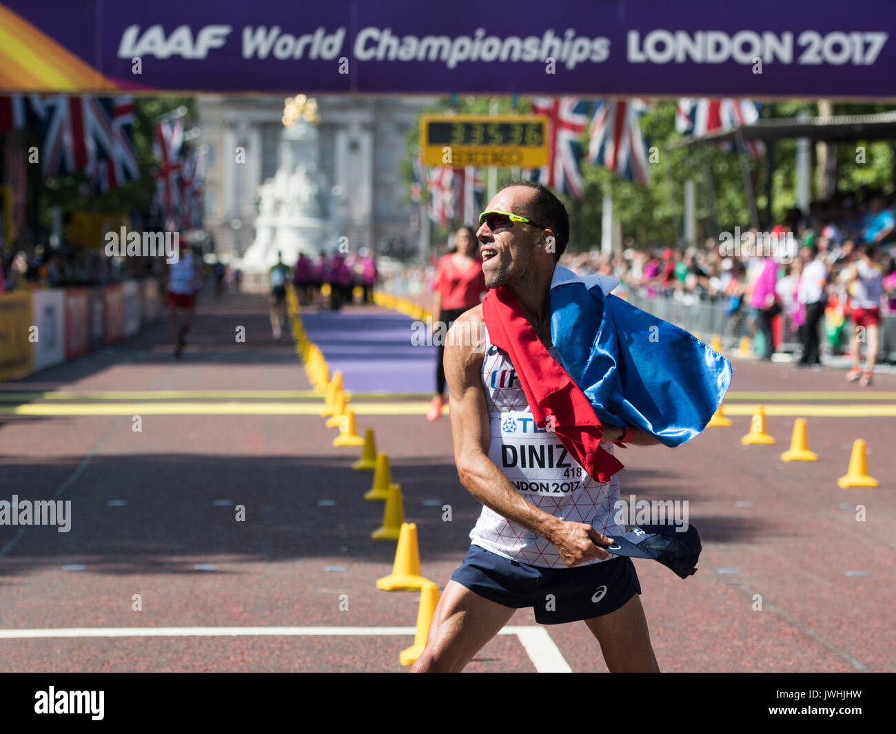 London, UK. 13th Aug, 2017. French athlete Yohann Diniz celebrates after competing in the 50 kilometer marathon at the IAAF London 2017 World Athletics Championships in London, United Kingdom, 13 August 2017. Diniz finished in first place. Photo: Bernd Thissen/dpa/Alamy Live News Stock Photo