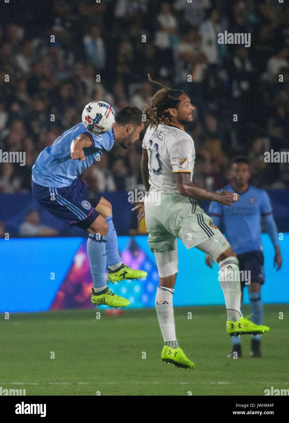 Carson, USA. 12th Aug, 2017. Jermaine Jones (R) of the Los Angeles Galaxy vies with David Villa of New York FC during the 2017 Major League Soccer (MLS) match between Los Angeles Galaxy and New York FC in Carson, California, the U.S., Aug. 12, 2017. Credit: Javier Rojas/Xinhua/Alamy Live News Stock Photo