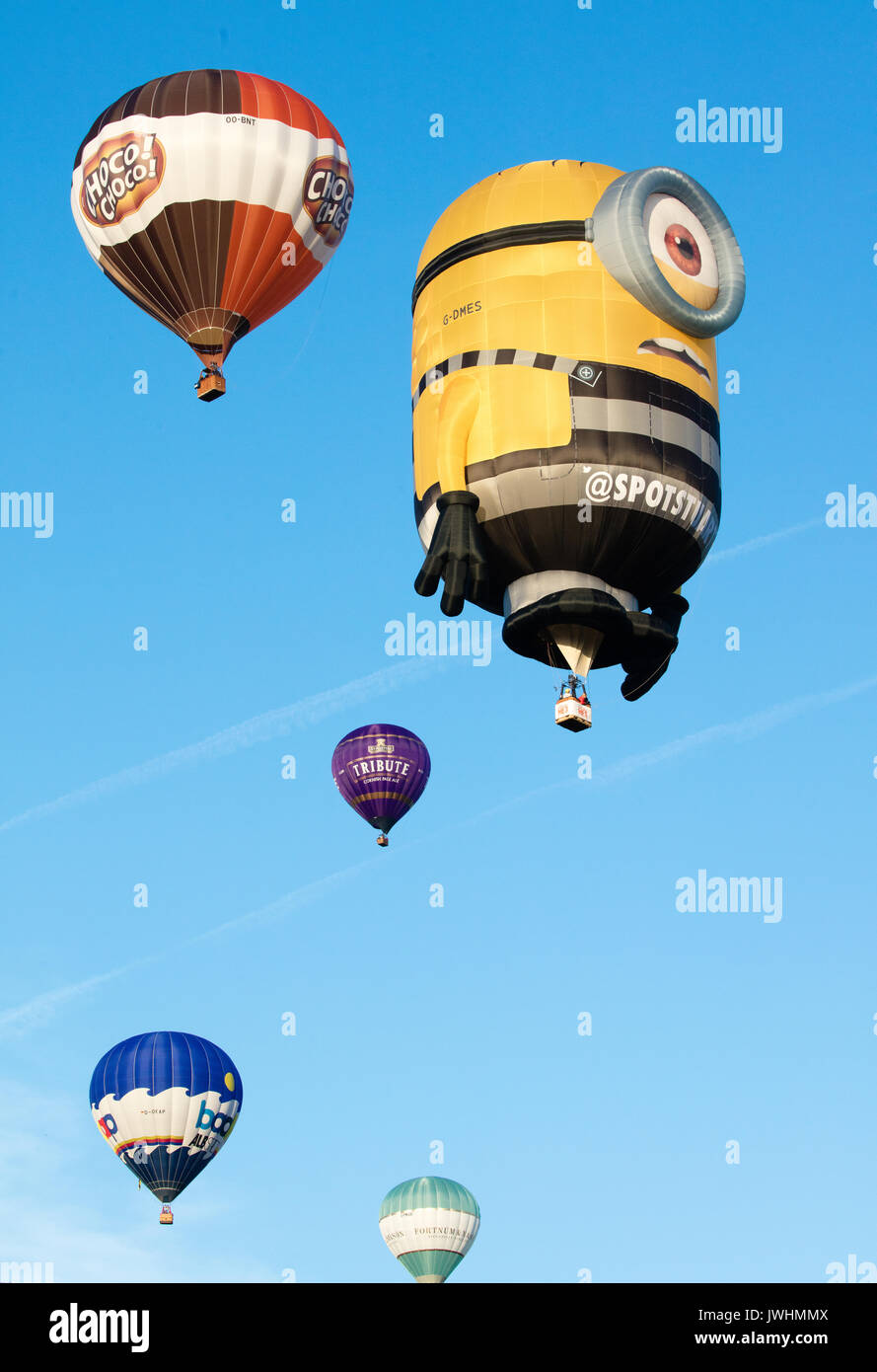 Bristol, UK. 13th August, 2017. Some of the 130 plus balloons launched at dawn from Ashton Court park in Bristol on the final day of the 39th Bristol International Balloon Fiesta 2017 including Stuart the Minion Credit: Steve Taylor ARPS/Alamy Live News Stock Photo