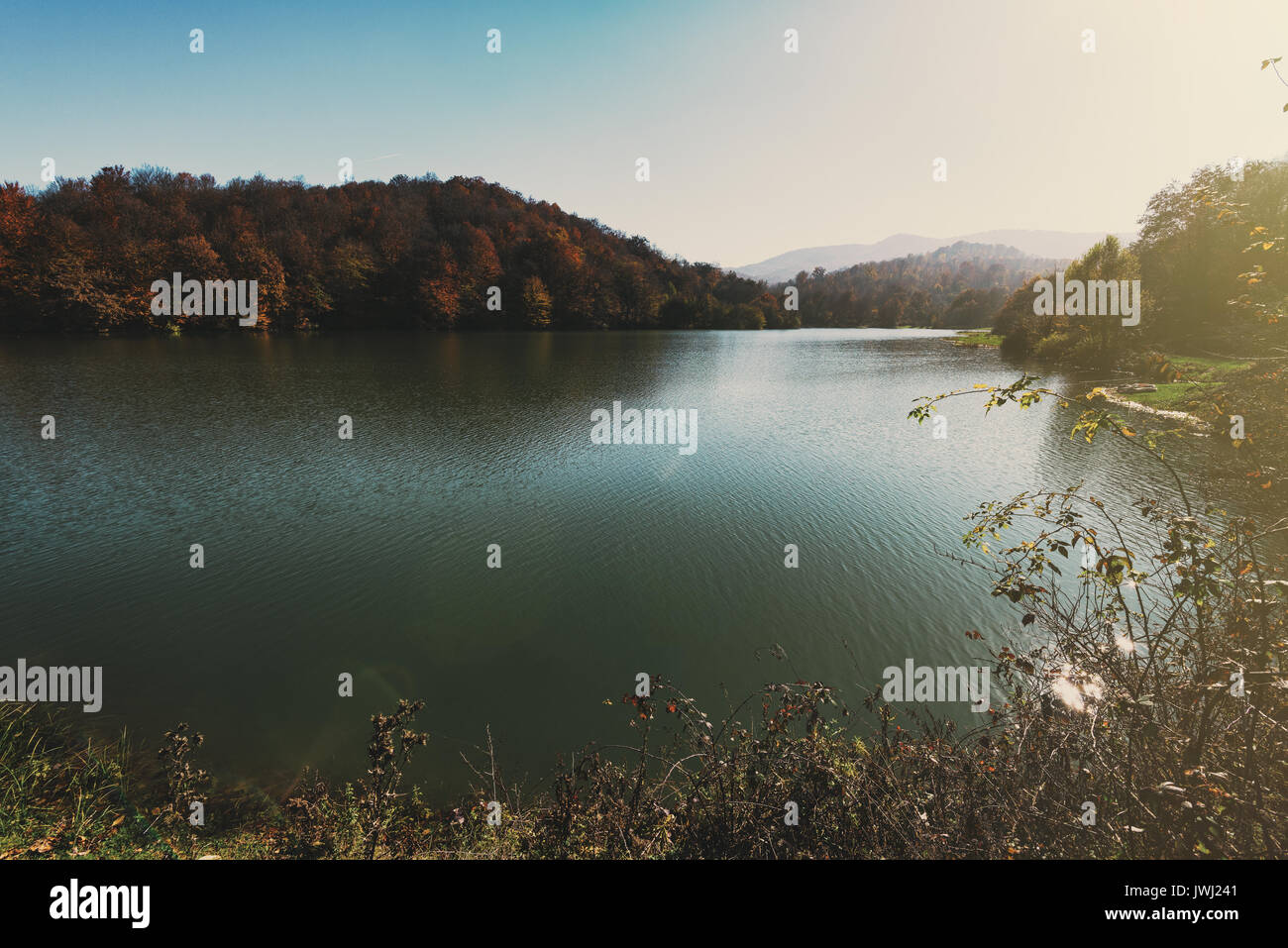 High mountain lake in autumn time Stock Photo