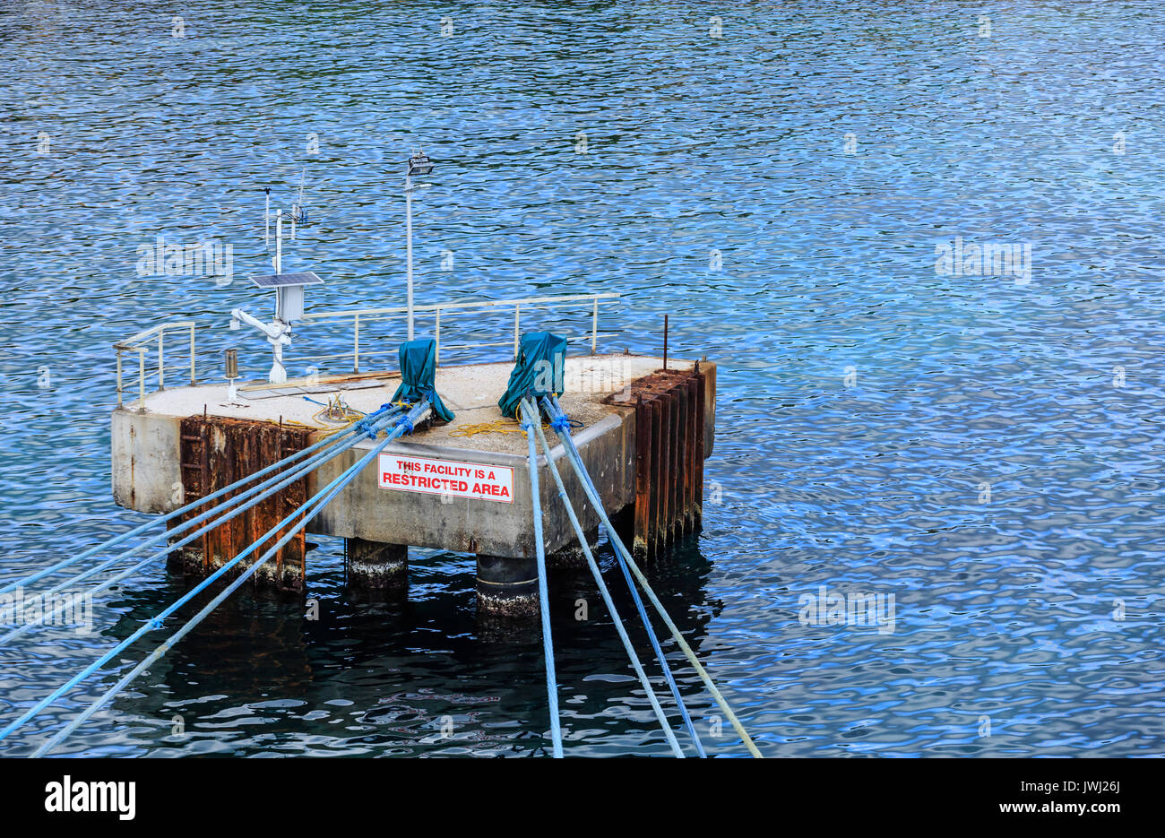 Blue Ropes on Mooring Platform Restricted Area Stock Photo - Alamy