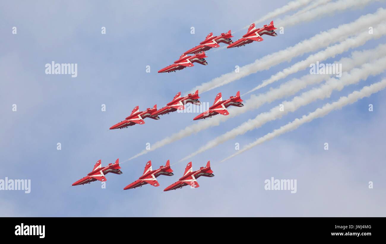Red Arrows flying in formation at Shuttleworth Stock Photo