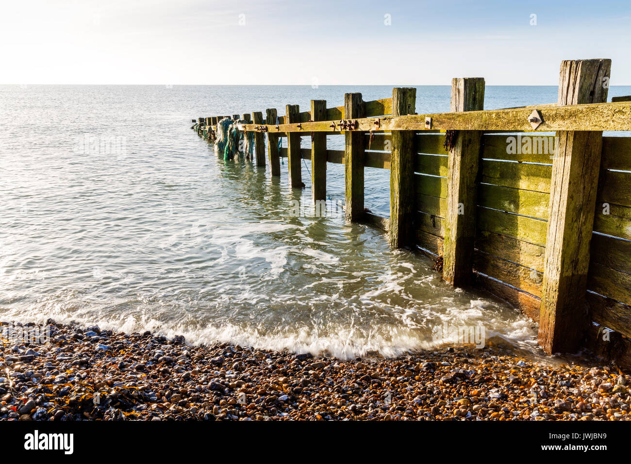 Wooden Groynes on the Sussex Coast, South of England, UK Stock Photo