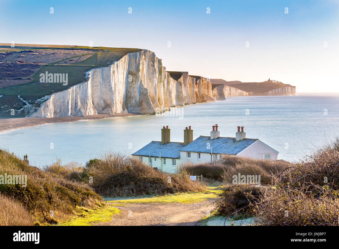 The Coast Guard Cottages & Seven Sisters Chalk Cliffs just outside Eastbourne, Sussex, England, UK. Stock Photo