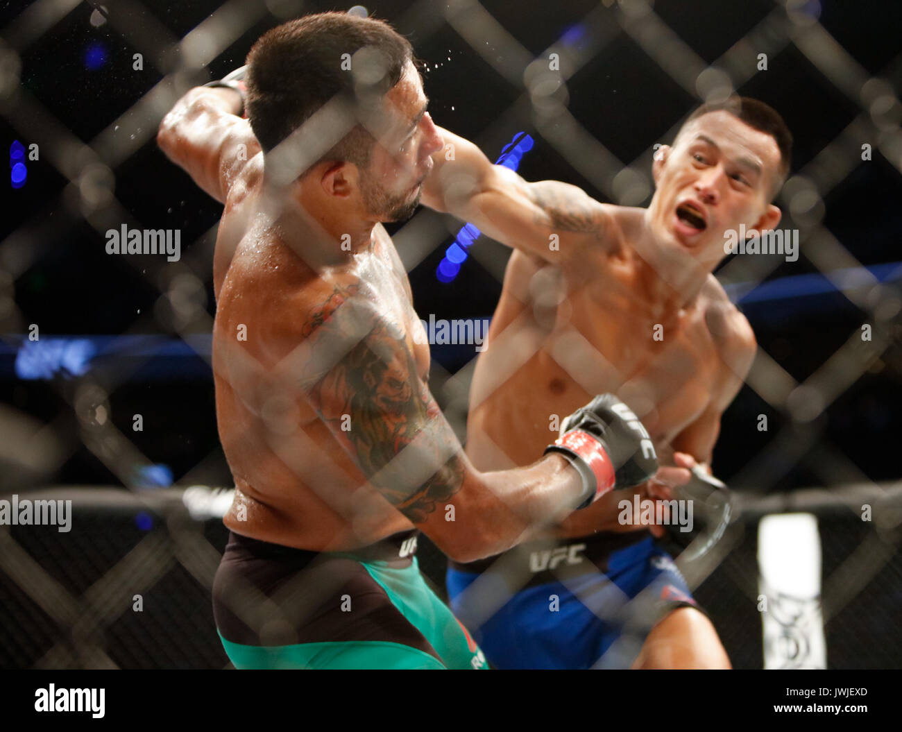 Alejandro Perez takes Andre Soukhamthath during UFC Fight Night 114 Mexico City,Mexico Stock Photo