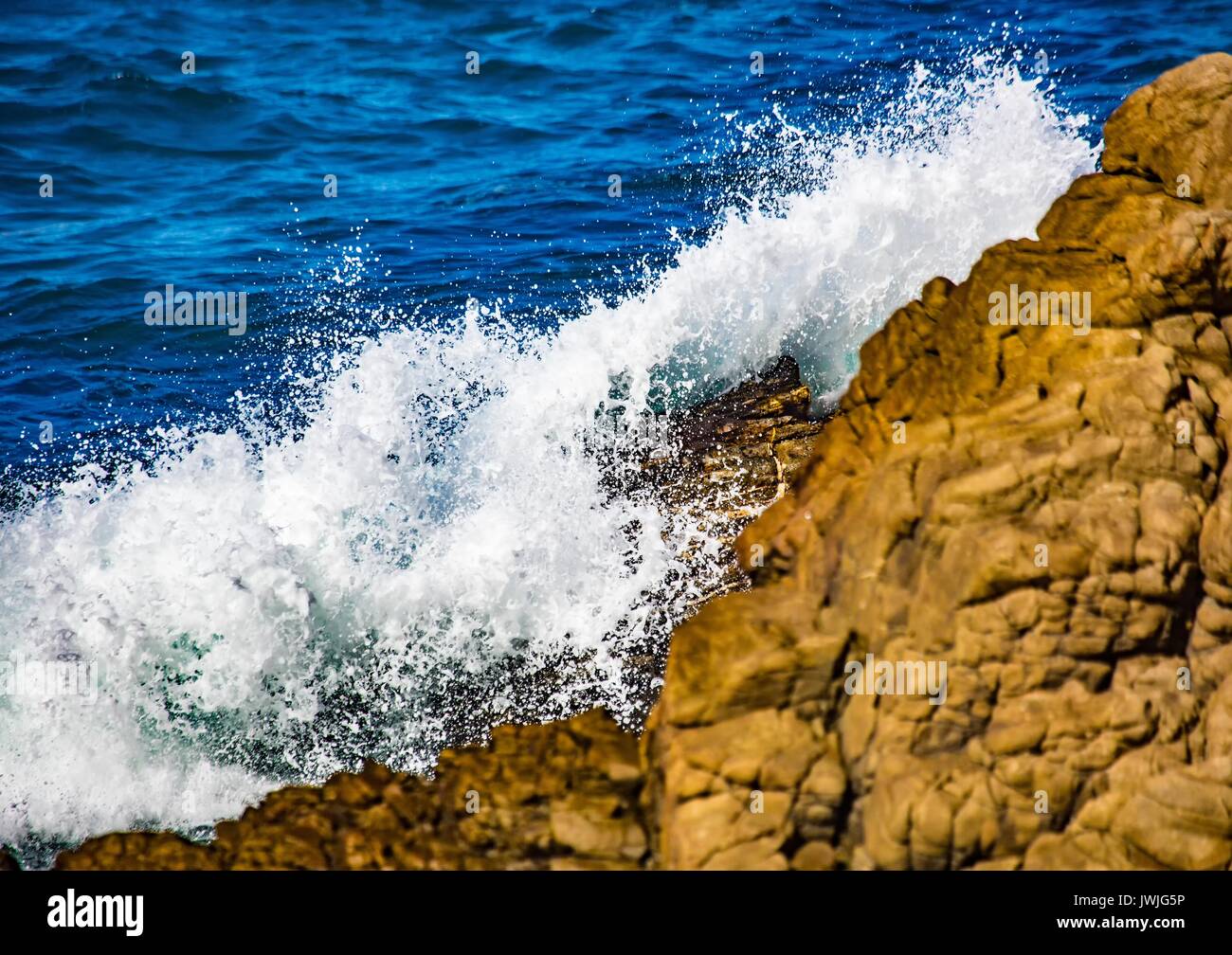 Breaking waves on the coast of the Otter Trail at the Indian Ocean in South Africa Stock Photo