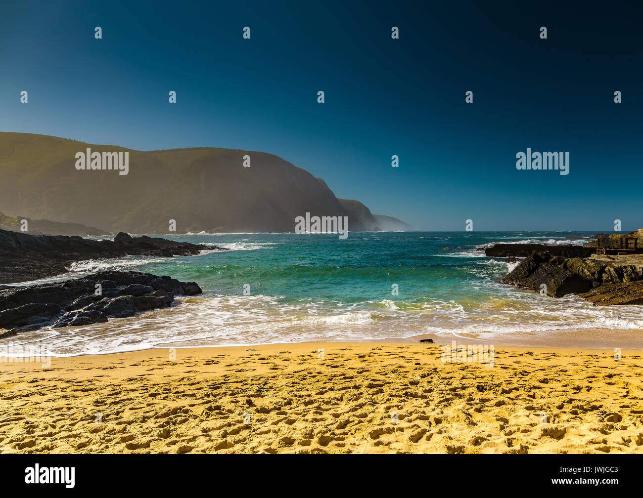Beach at the Storms River Mouth at the Indian Ocean in South Africa Stock Photo