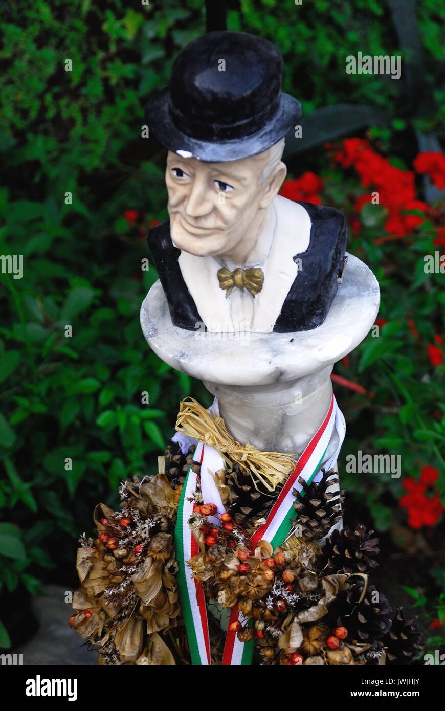 A statuette of Totò in a garden of Naples. Stock Photo