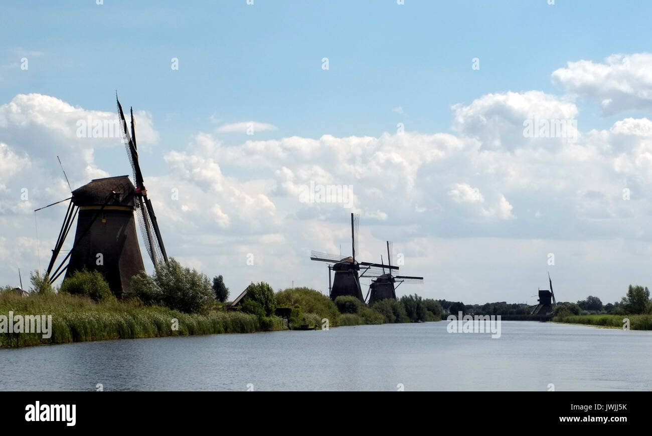 Windmills are seen at the the Kinderdijk UNESCO World Heritage site, in the Dutch countryside, Holland, the Netherlands, August 6, 2017.© John Voos Stock Photo